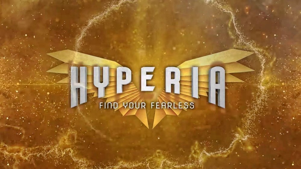 Thorpe Park Hyperia banner - it simply says Hyperia Find your fearless - and the background is a mass of orangey-gold colours.