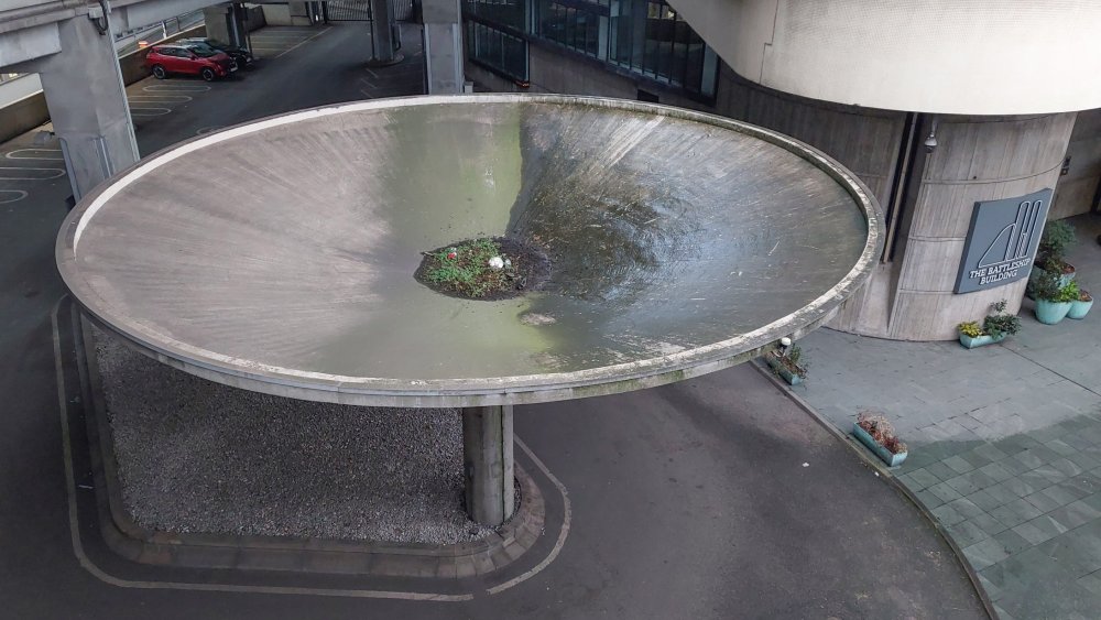This large canopy by the main entrance to the Battleship building can be seen form the Westway. It was once a steam cleaning point for vehicles belong to British Railways.