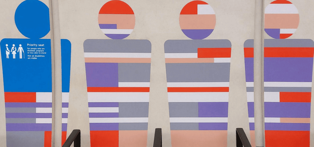 The four seat covers at each station represents the lines served by these interchange stations. They're basic variations on TfL's seat moquette designs.