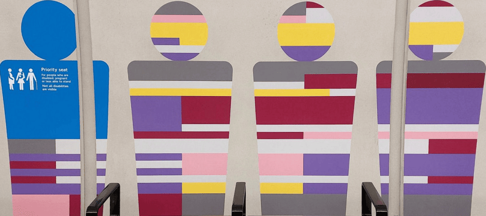 The four seat covers at each station represents the lines served by these interchange stations. They're basic variations on TfL's seat moquette designs.