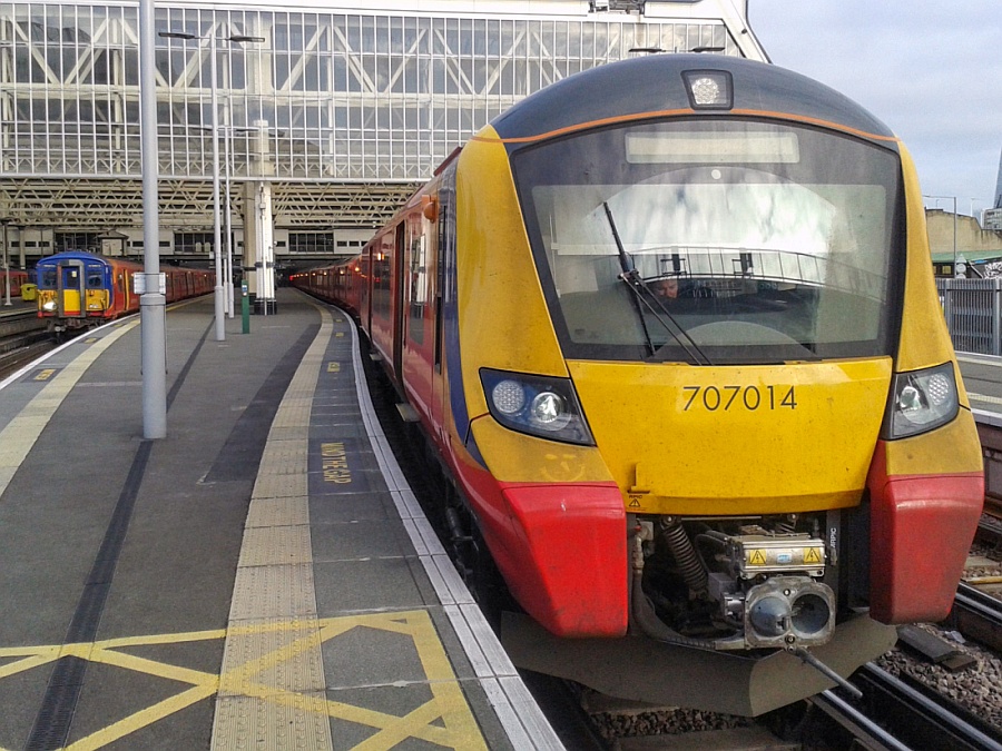 707014 sits in the winter sunshine at the country end of Waterloo station.